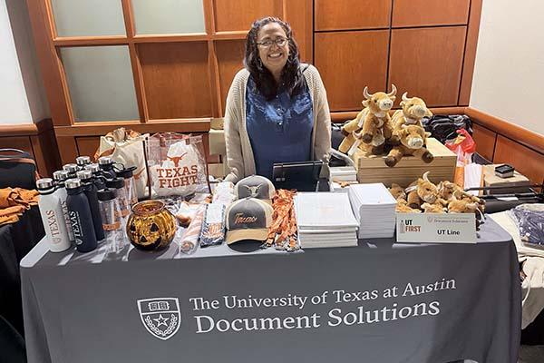 Staff at UT First Document Solutions Table