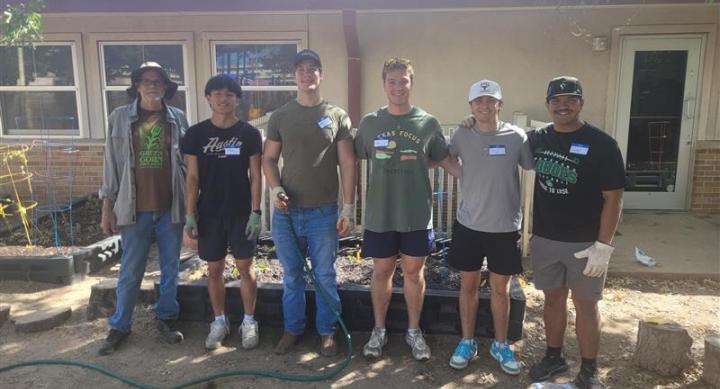 Volunteers work on CDC gardens